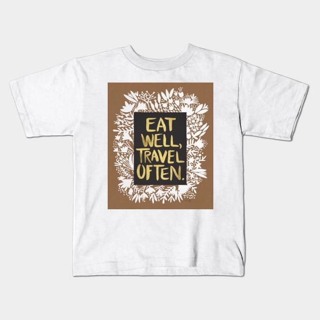 Eat well, travel often Kids T-Shirt by CatCoq